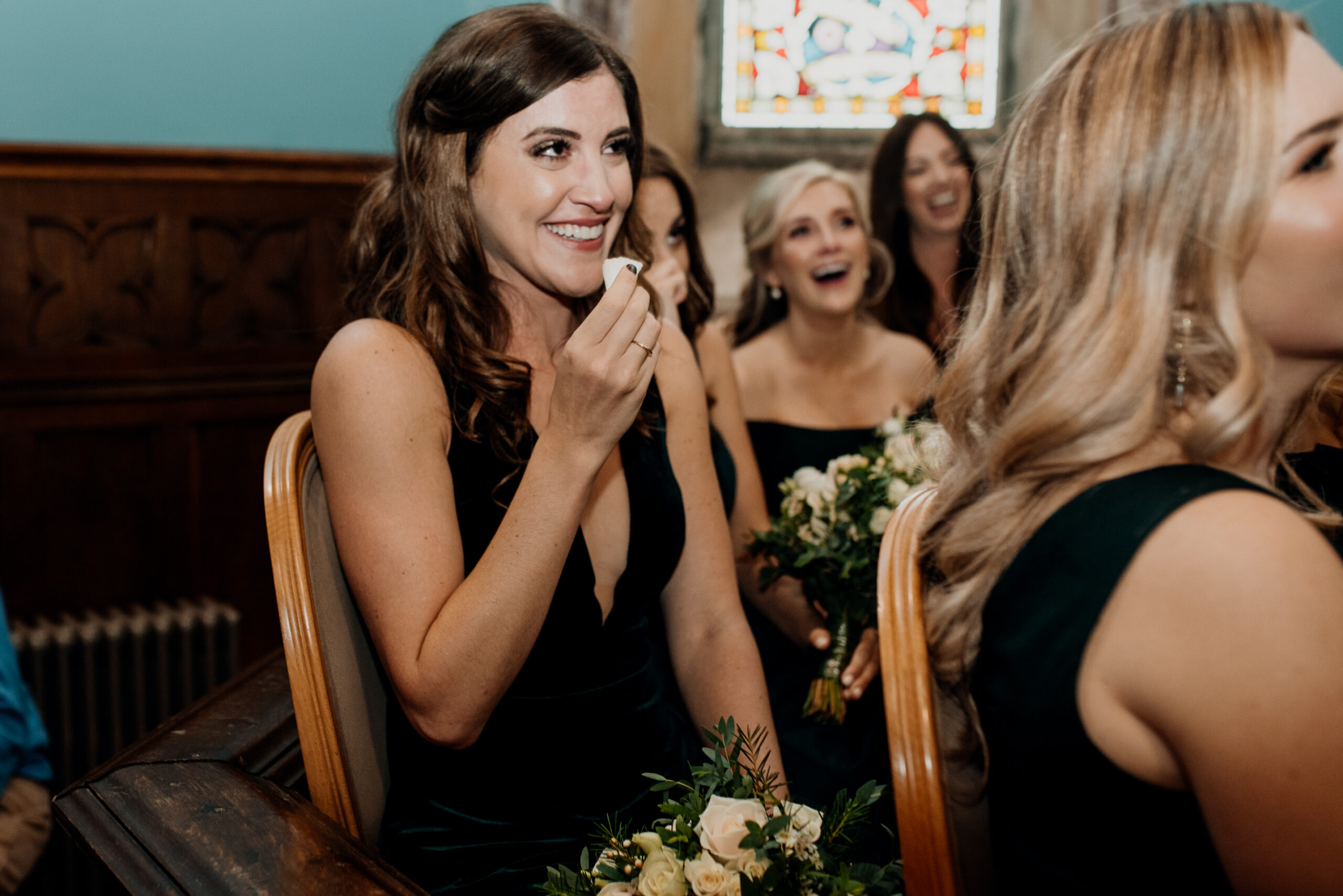 A group of women sitting in chairs