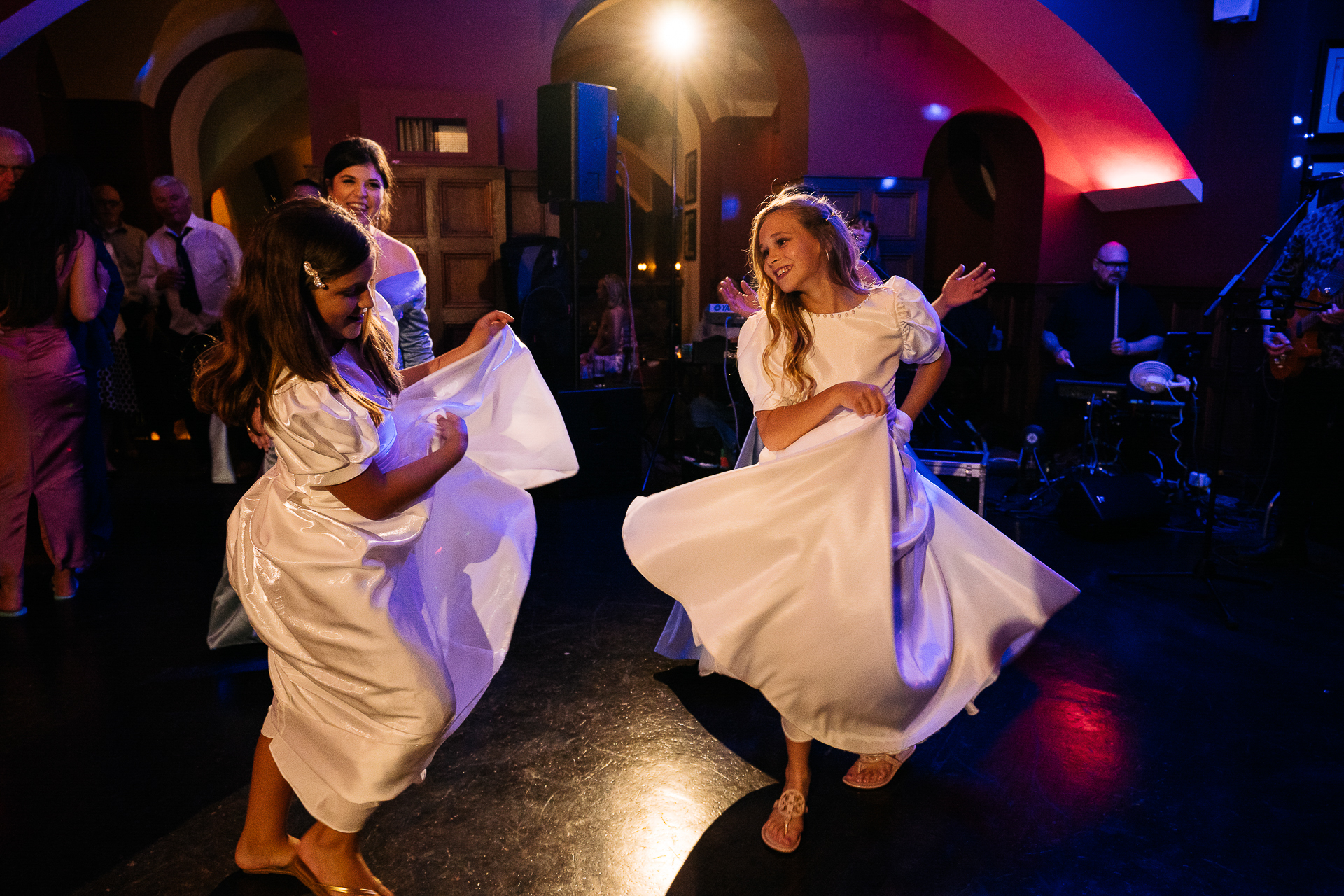 A couple of women dancing