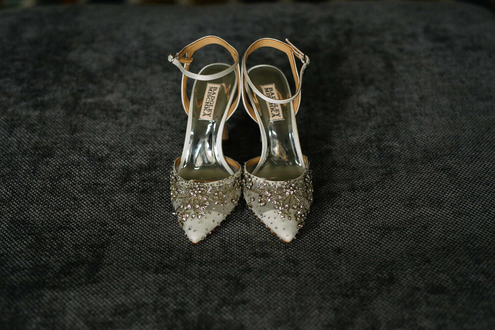 A pair of gold sandals