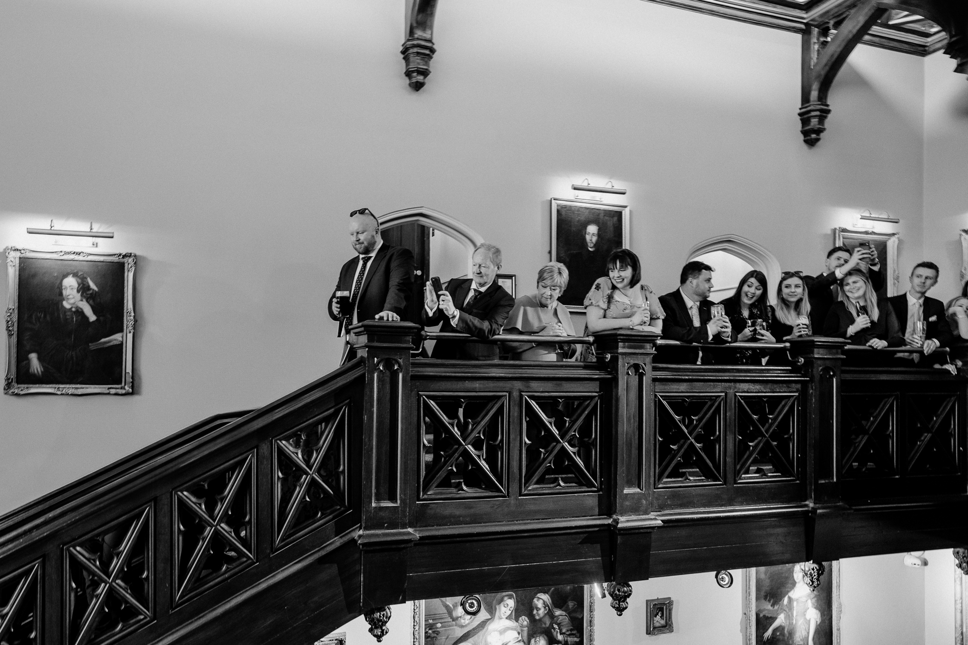 A group of people sitting on a piano