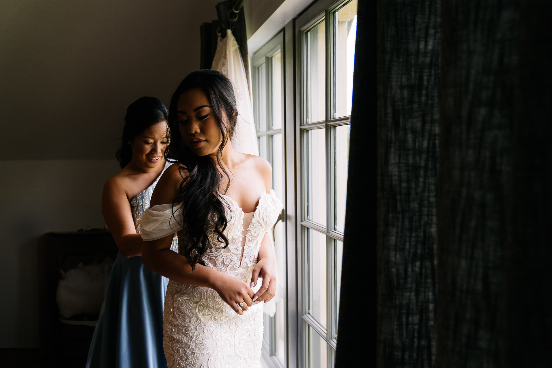 A woman in a white dress and a woman in a white dress