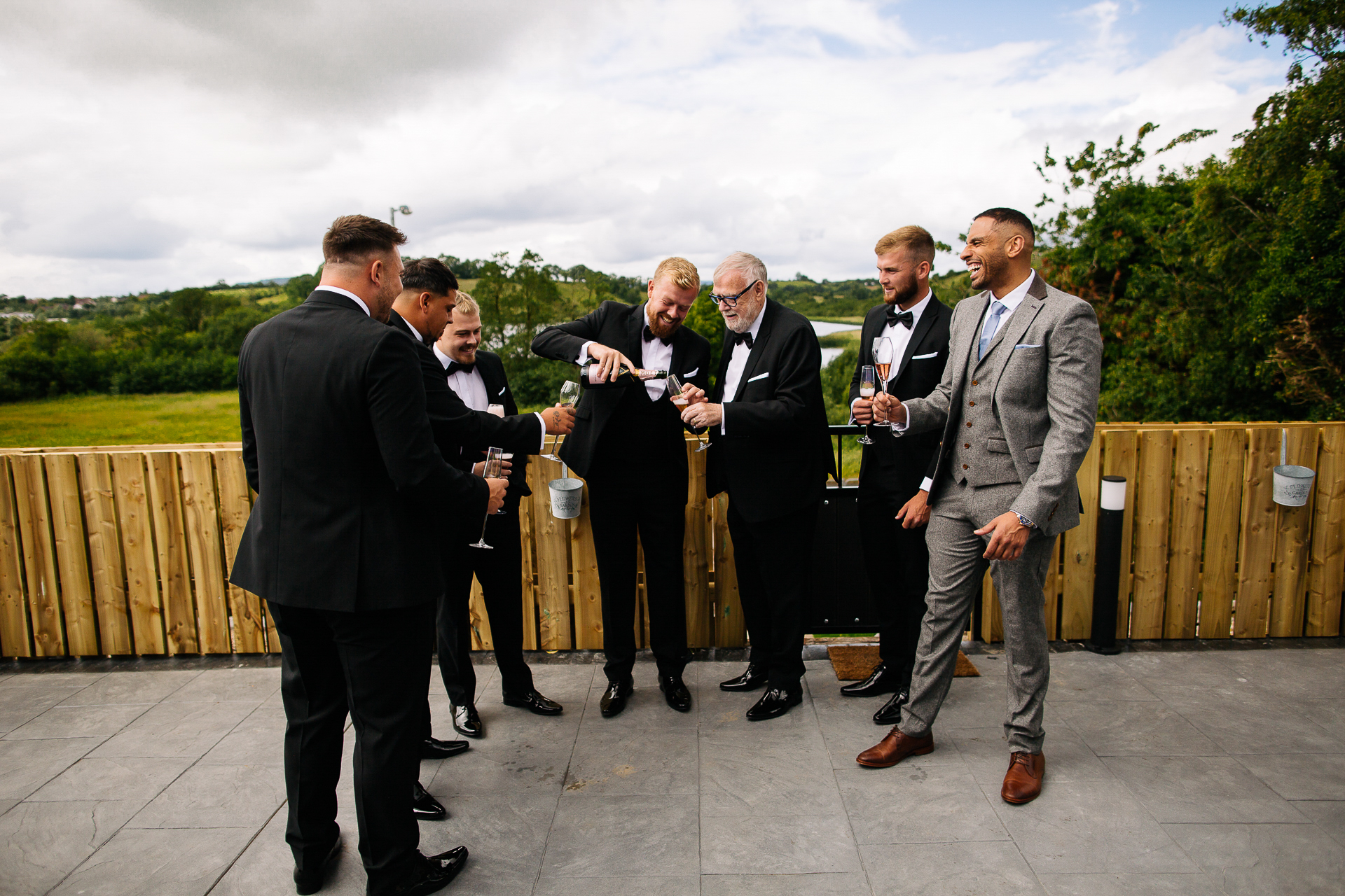 A group of men standing outside