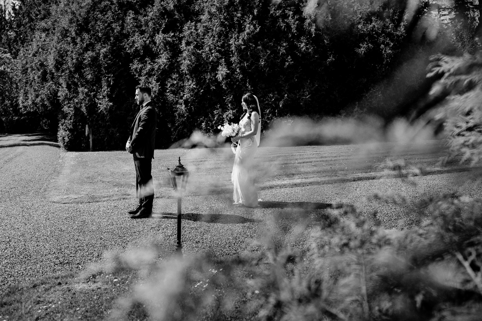 A man and woman walking down a road