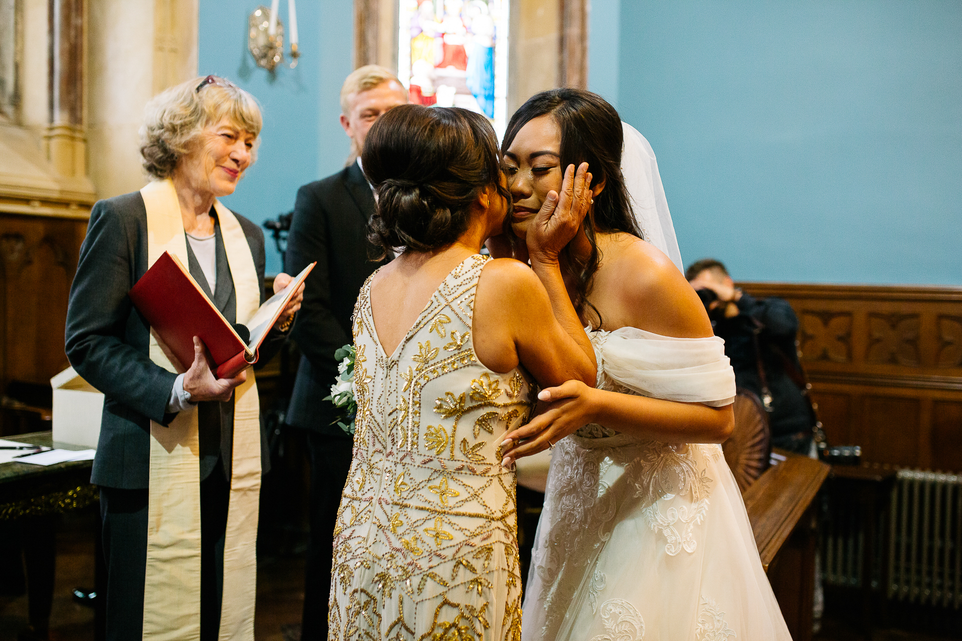 A person in a white dress and a person in a white dress