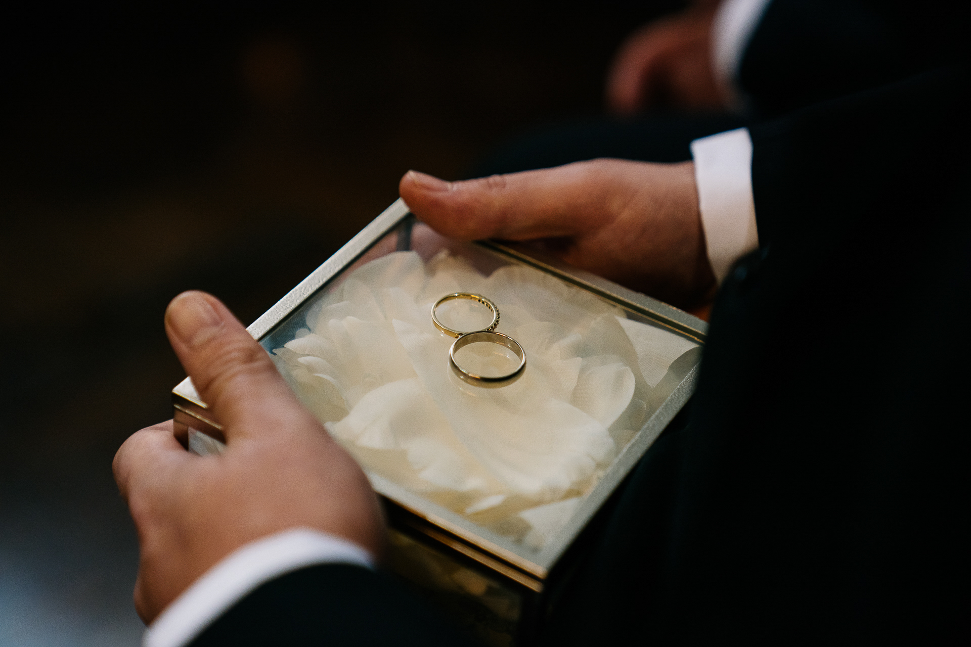 A person holding a ring