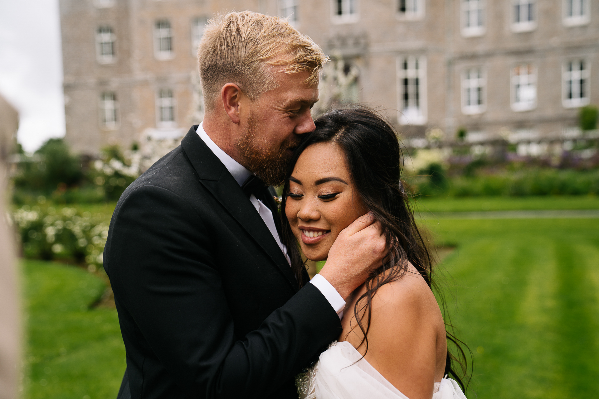 A man and woman posing for a picture