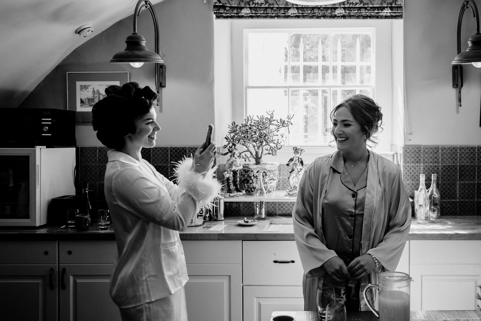 A woman and a man in a kitchen