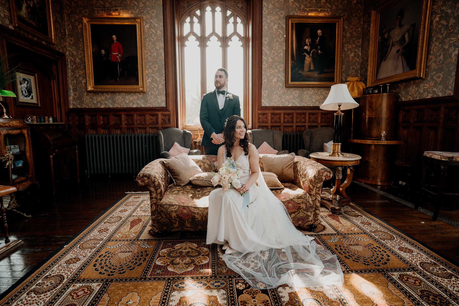 A bride and groom posing for a picture