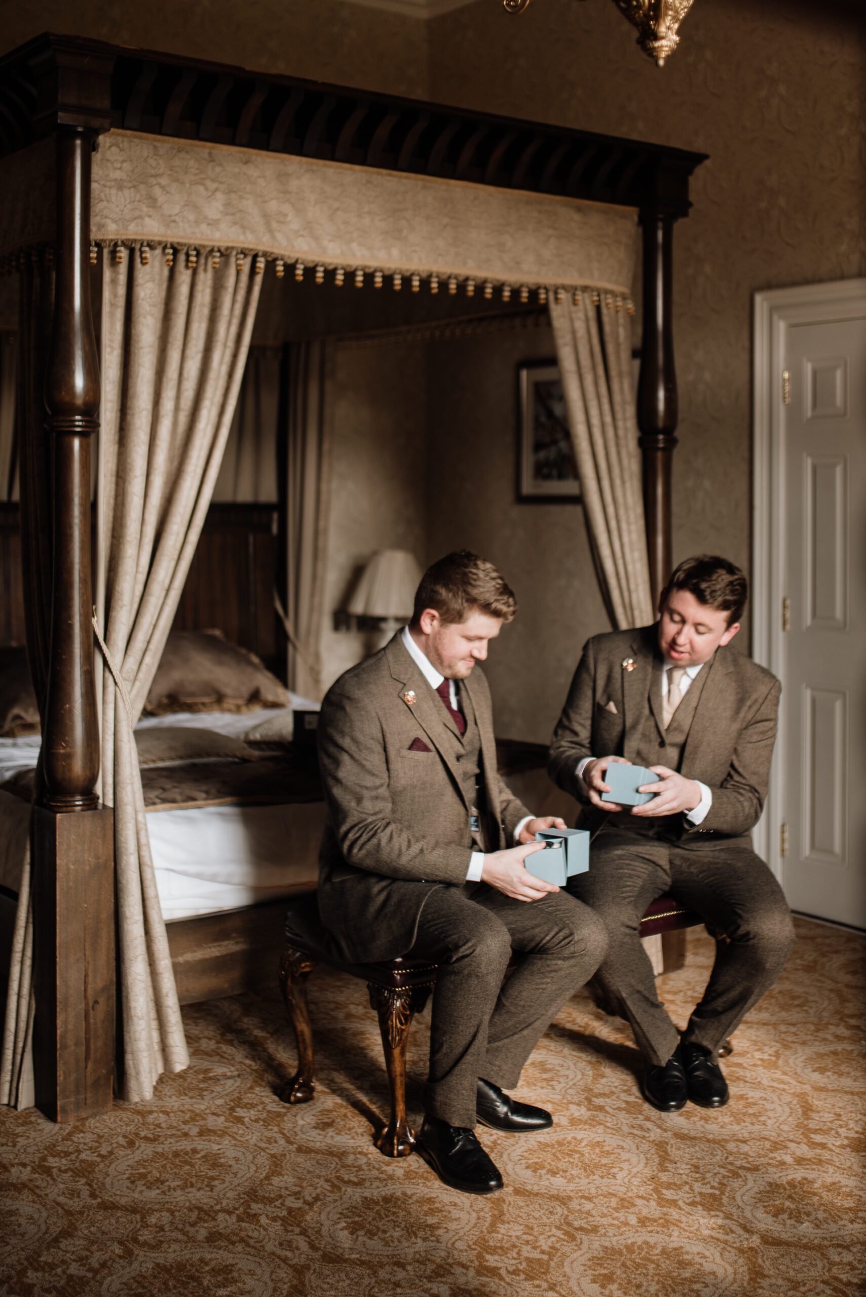 A couple of men sitting in chairs