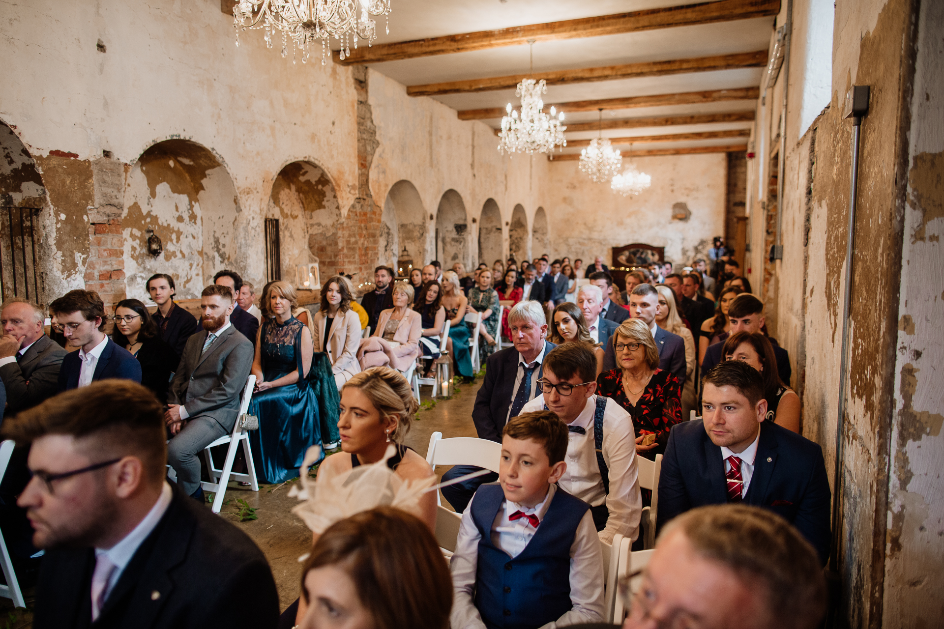 A group of people sitting in a room