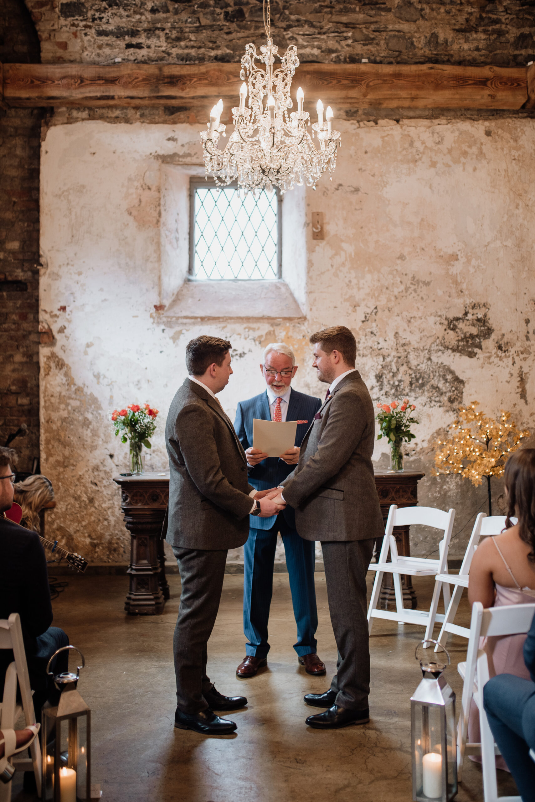 A group of men standing in a room