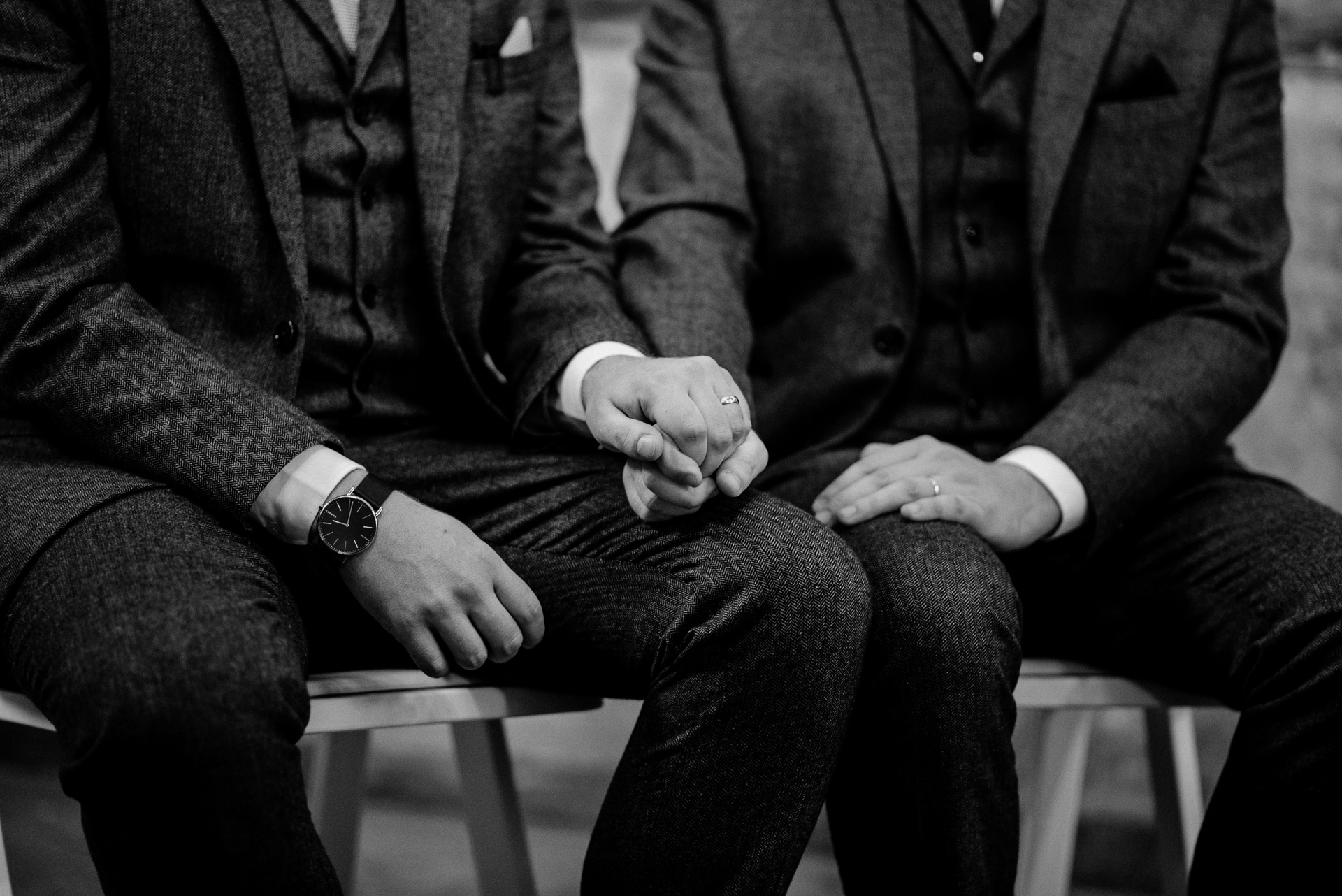 A couple of men sitting on a bench