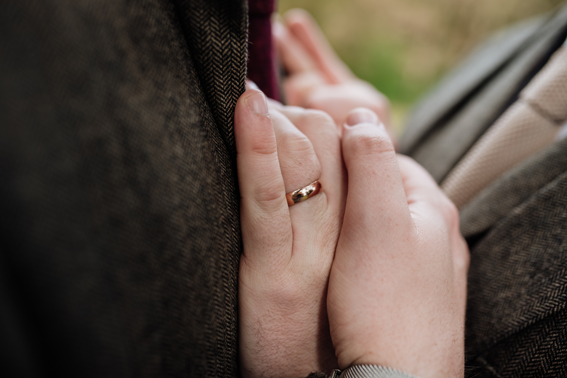 A person holding a ring