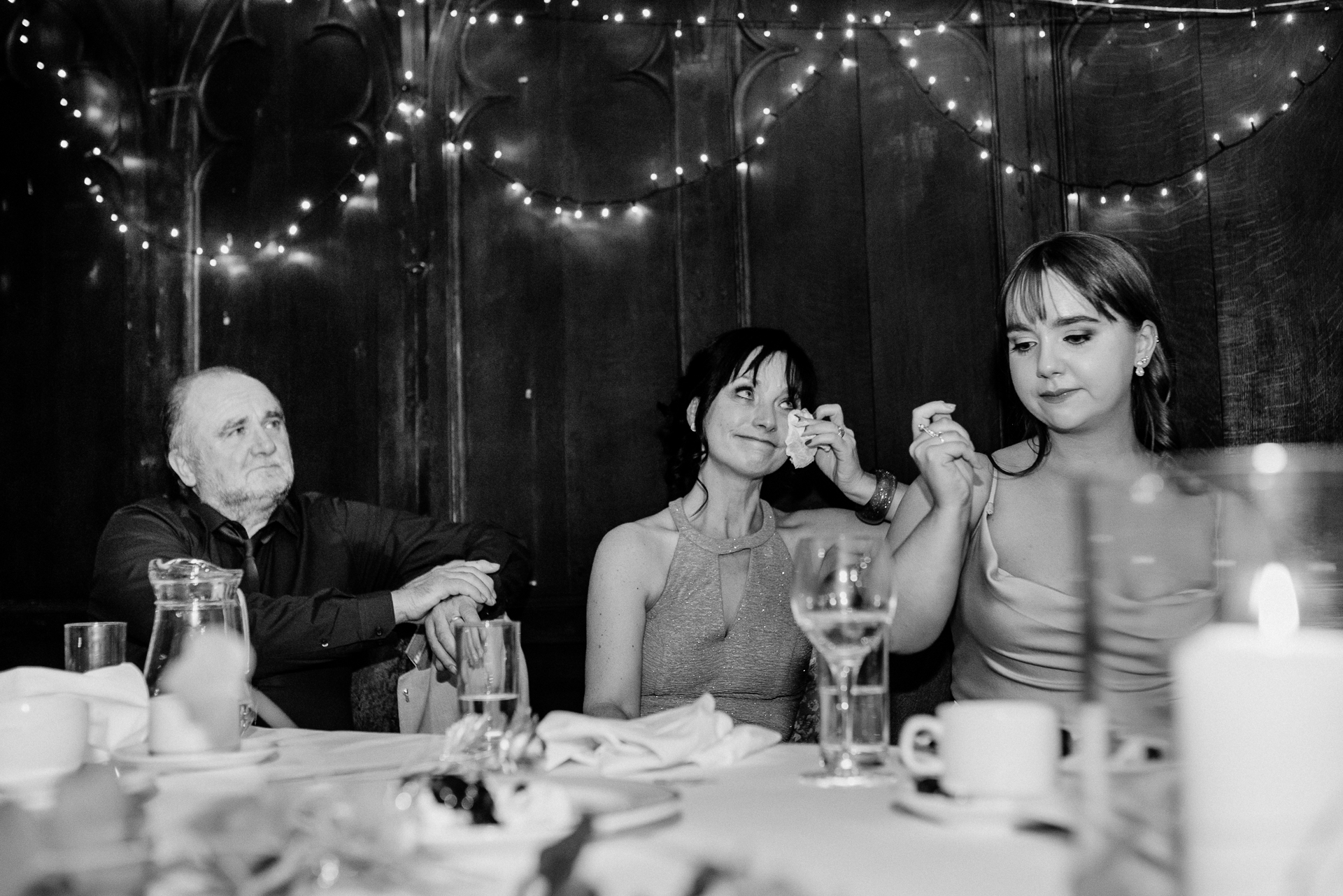 A group of people sitting at a table with drinks