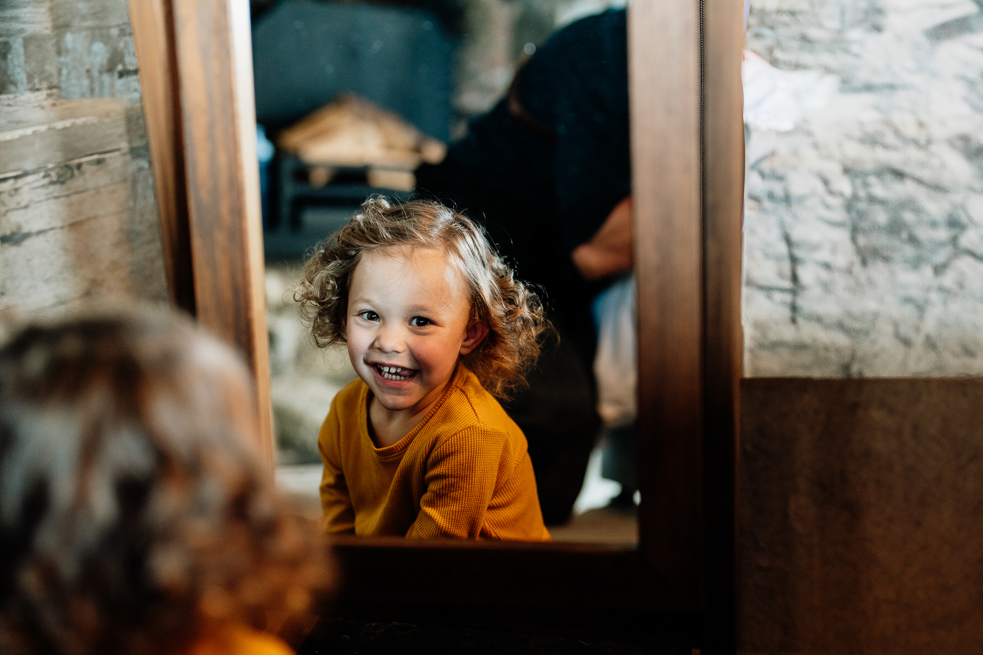 A child looking out a window