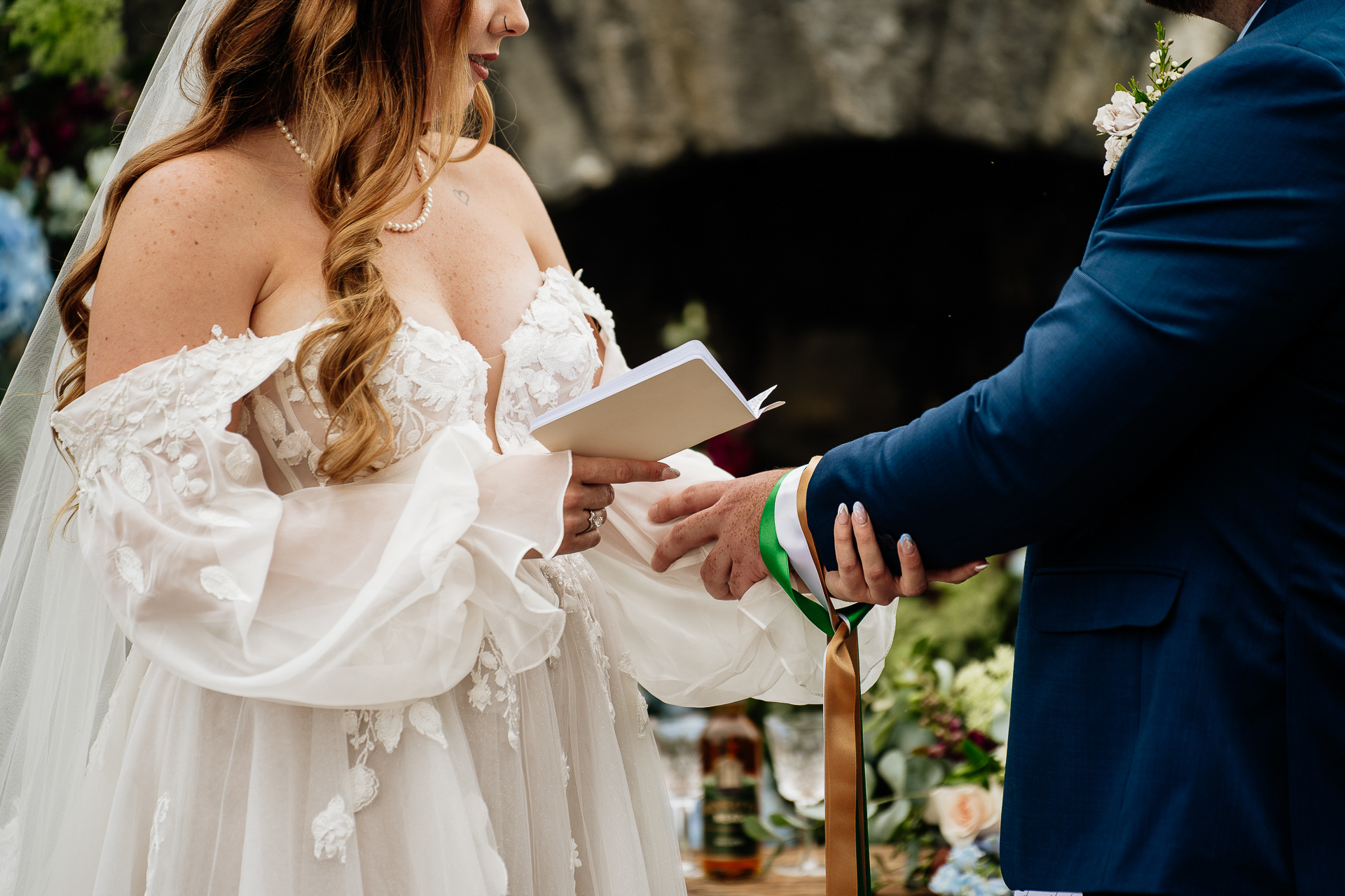 A bride and groom holding hands