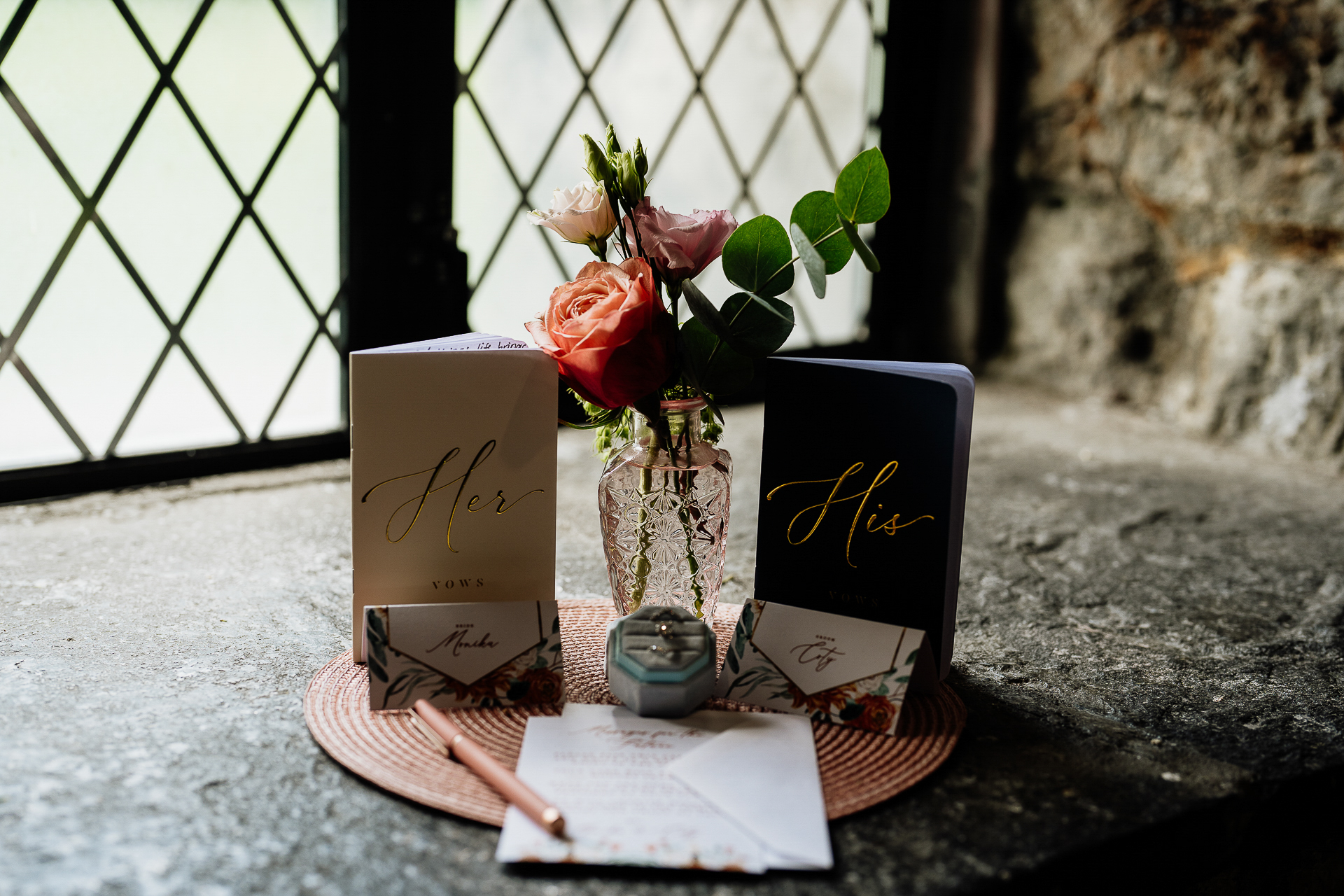 A vase with flowers and cards