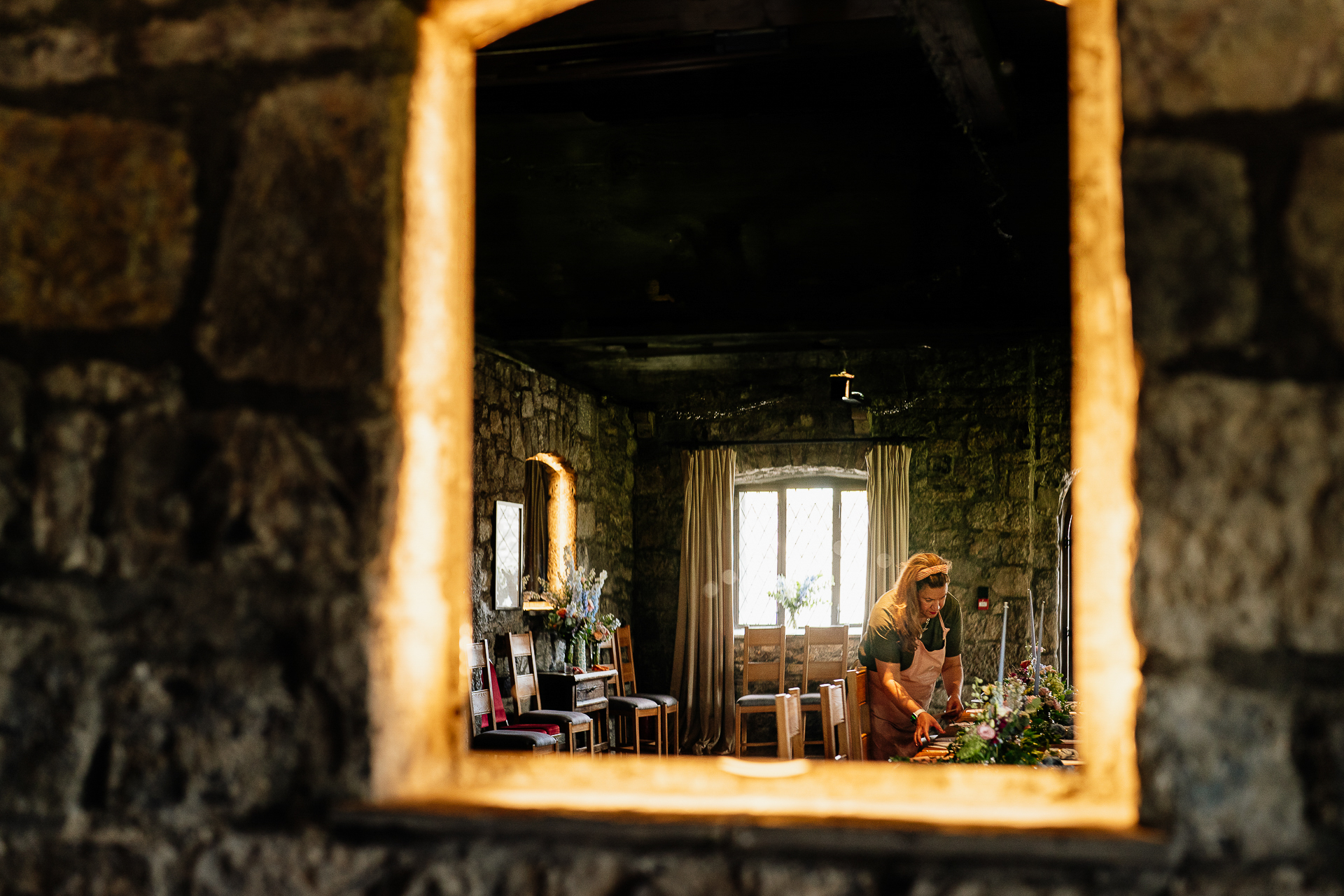 A person sitting in a doorway