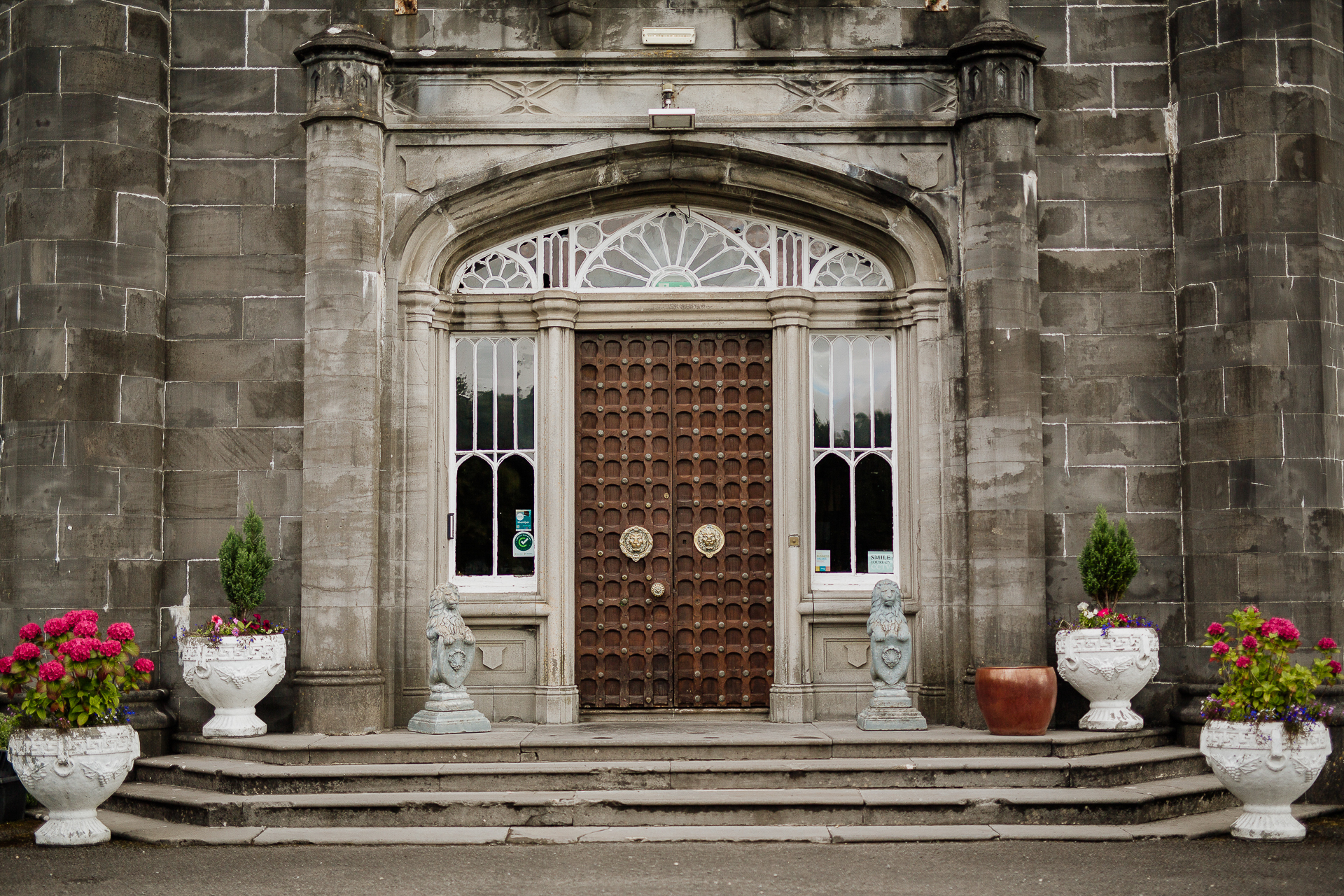 A door with flowers in front of it