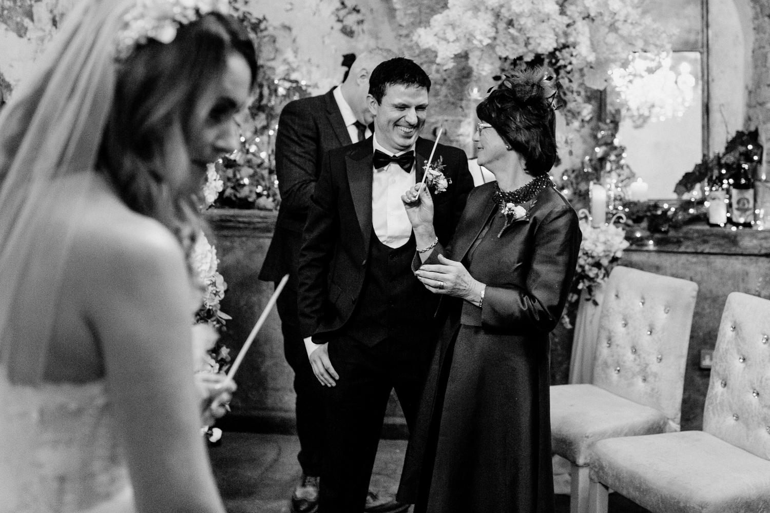 A man and woman cutting a wedding cake