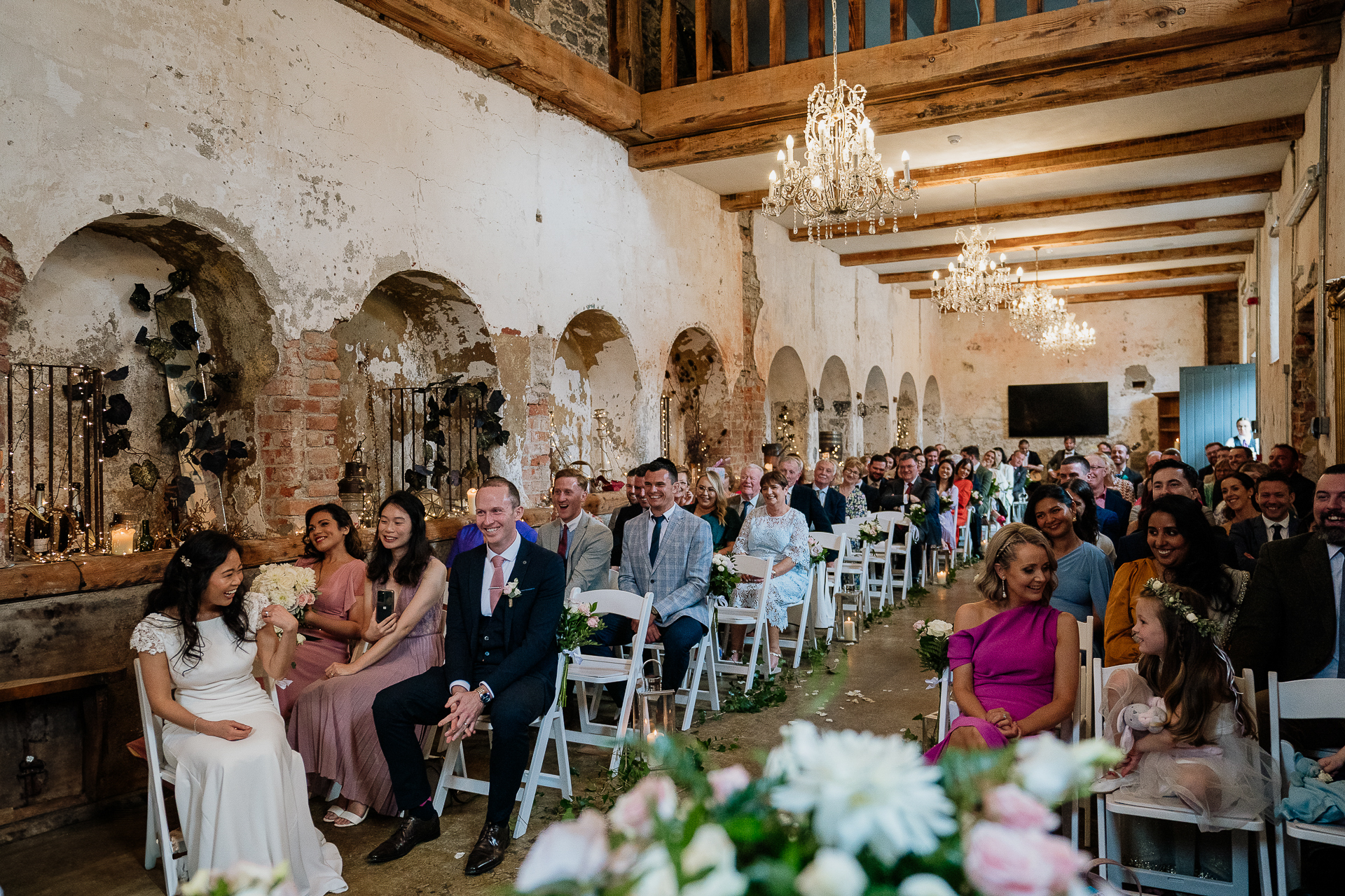 A wedding party in a large room