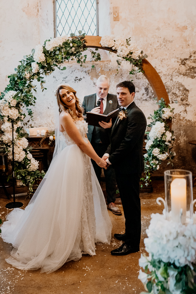 A man and woman in wedding attire