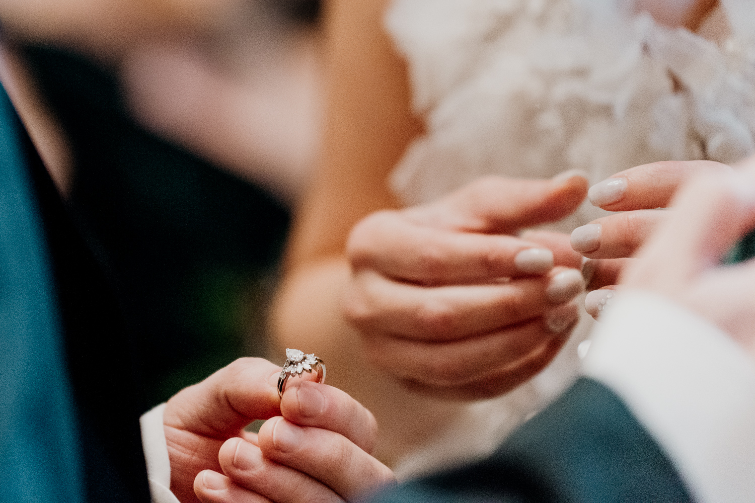 A person holding a ring