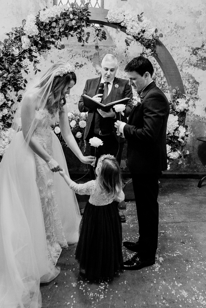 A bride and groom kissing