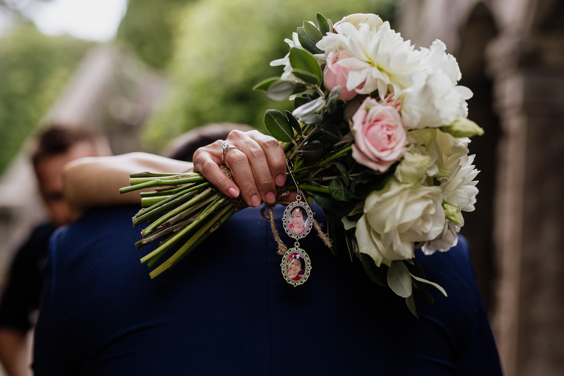 A person holding a bouquet of flowers