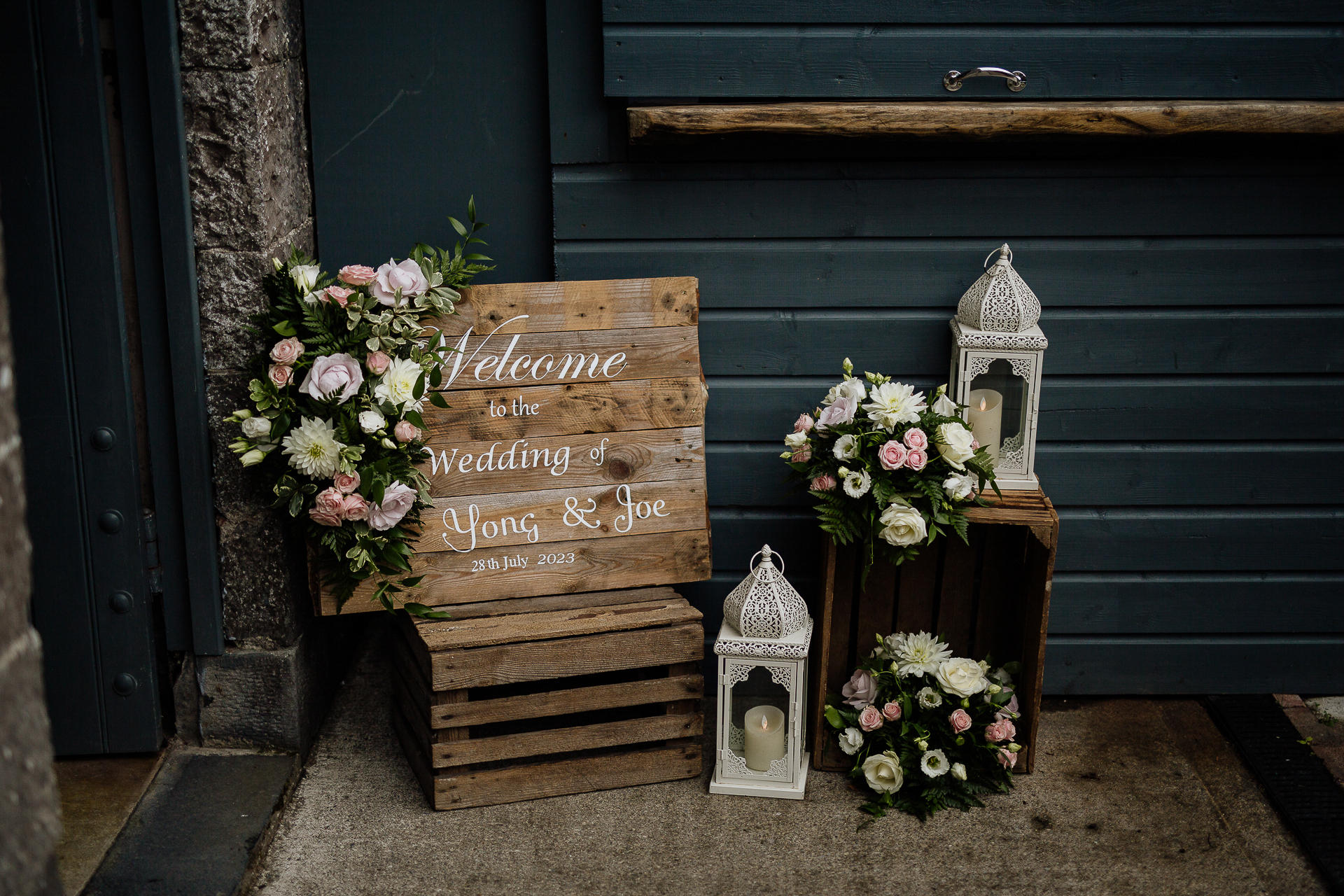 A group of tombstones with flowers