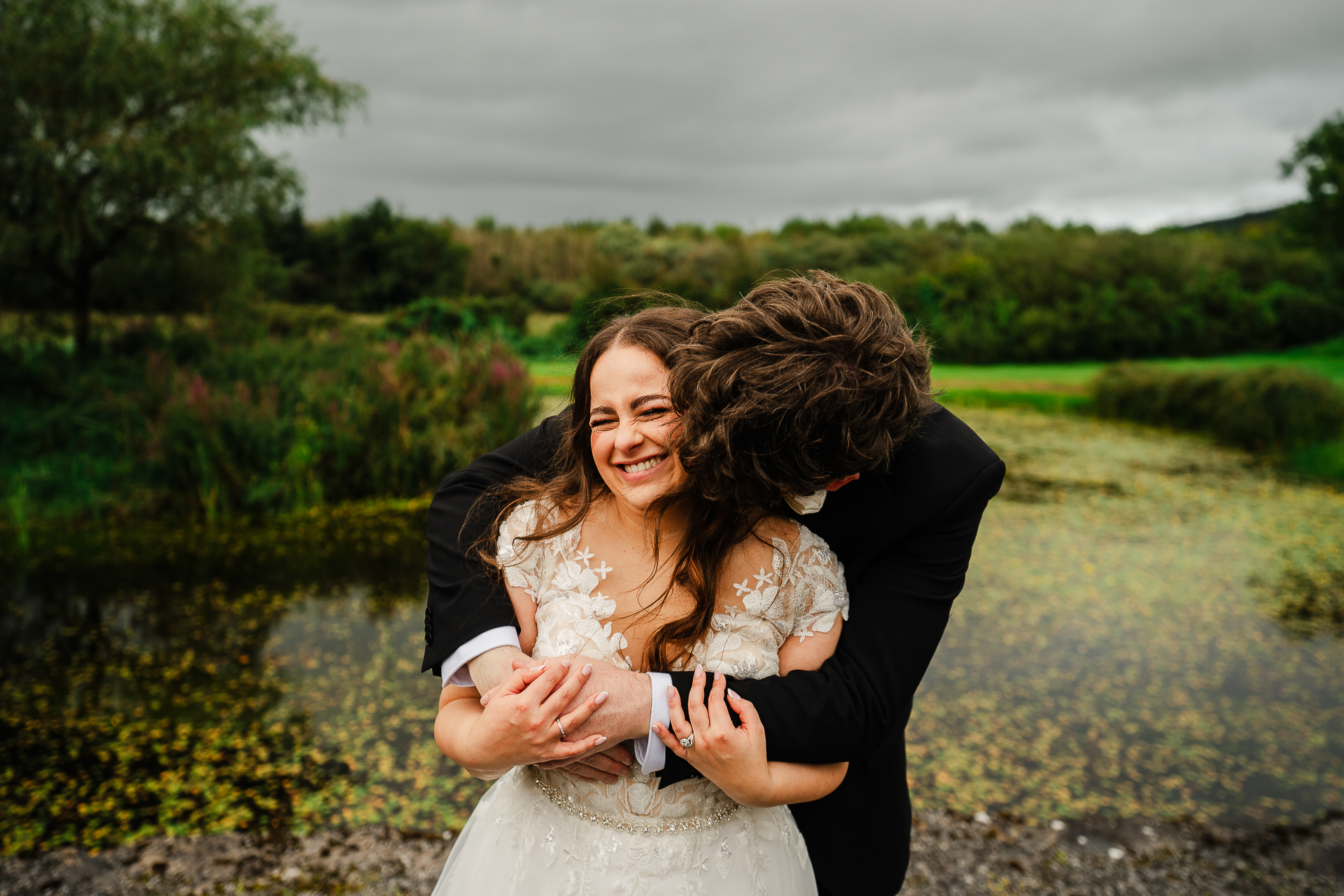 A woman hugging a man