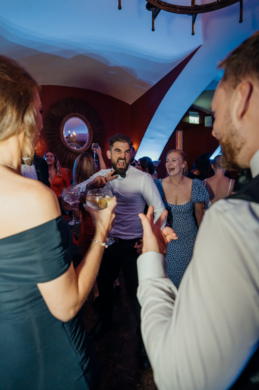 A group of people drinking wine