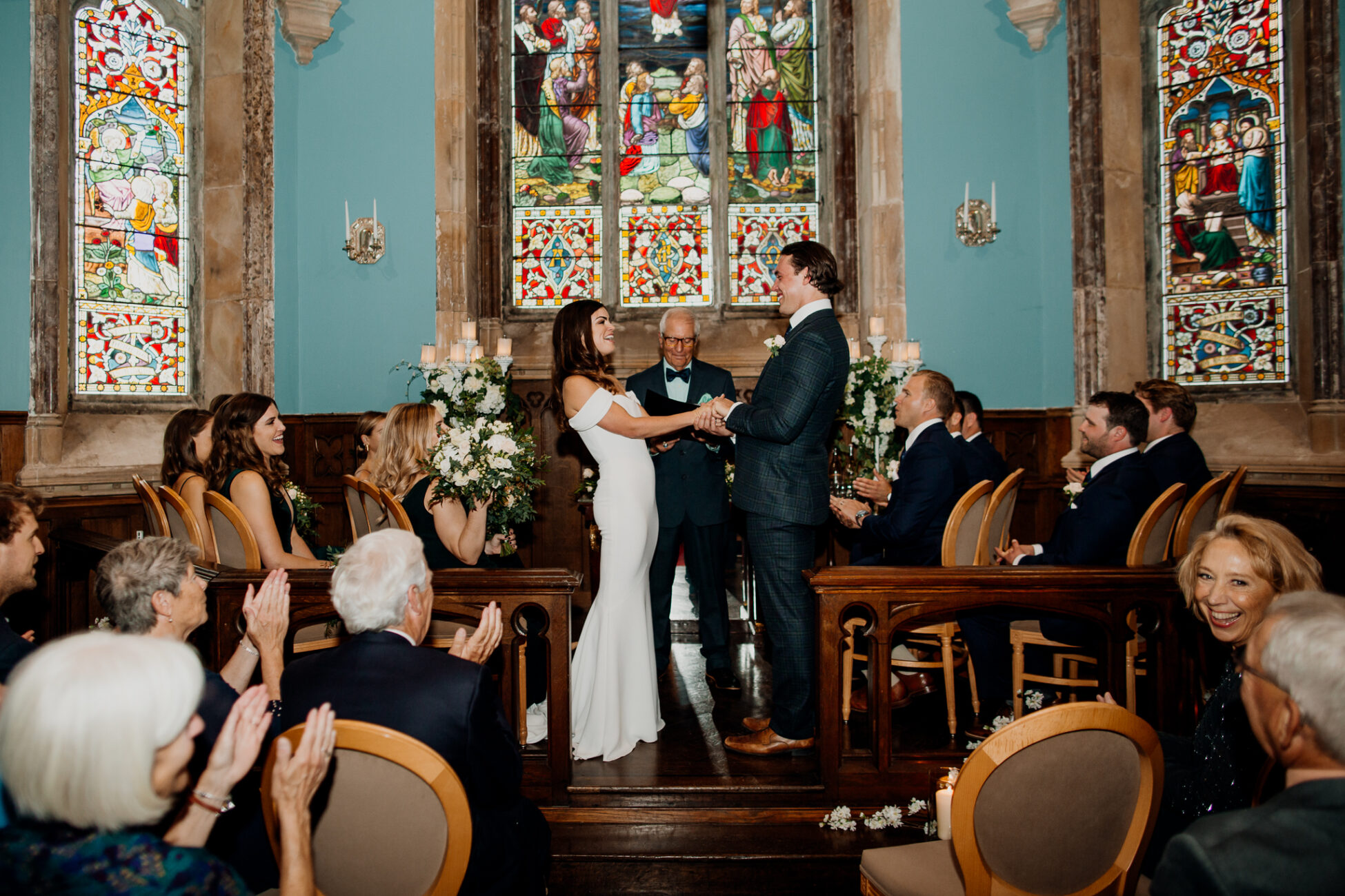 A bride and groom dancing in a church