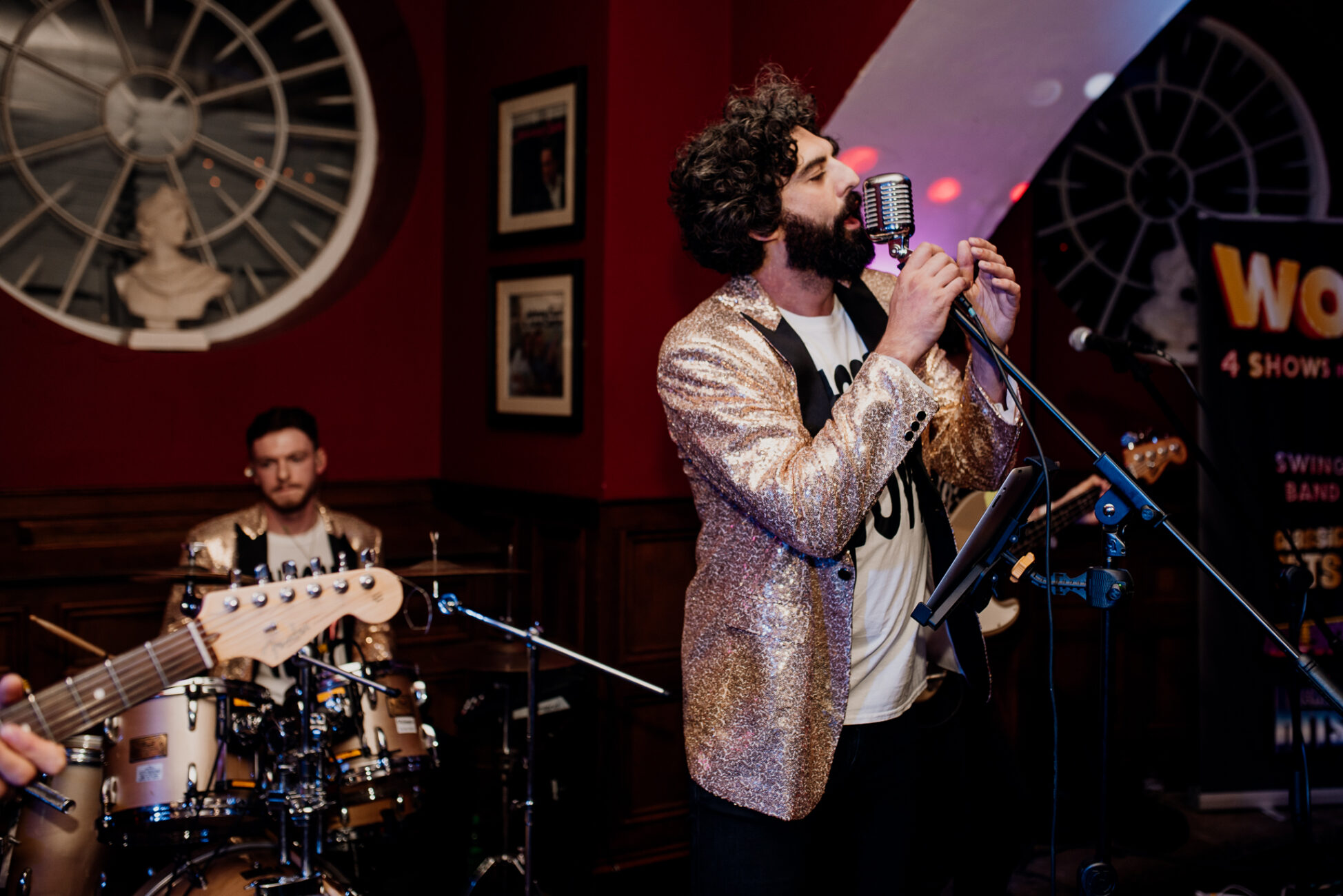 A person singing into a microphone