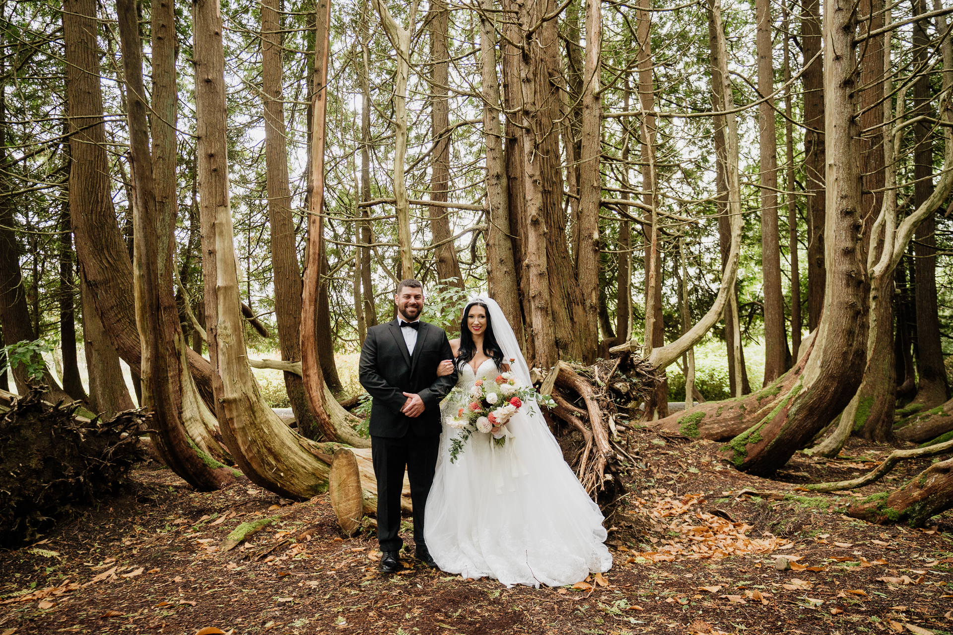 A man and woman in a forest