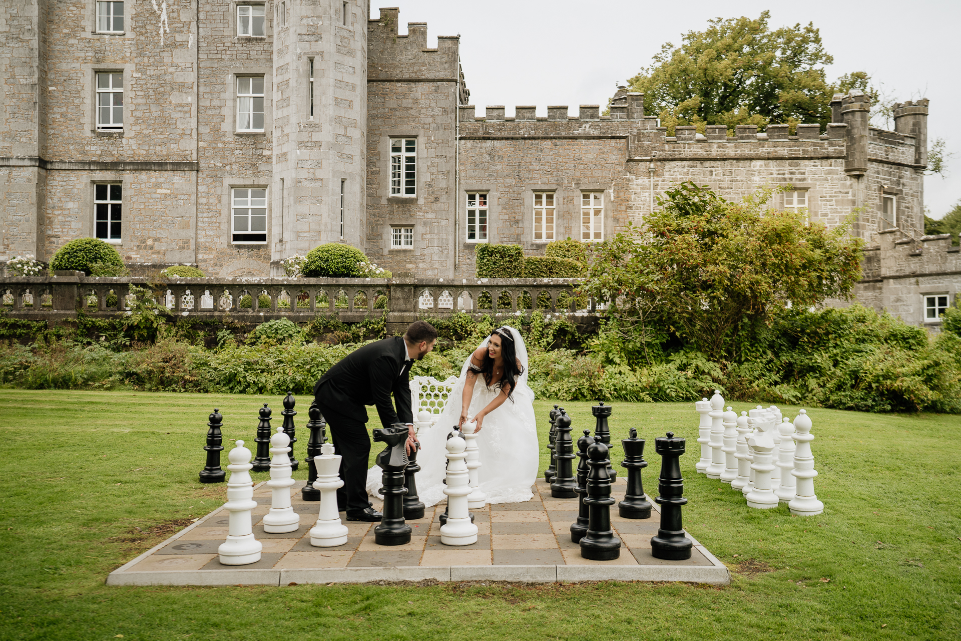 A man and woman playing chess