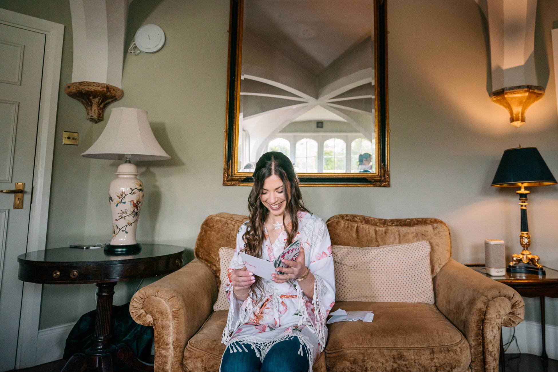 A woman holding a glass of wine