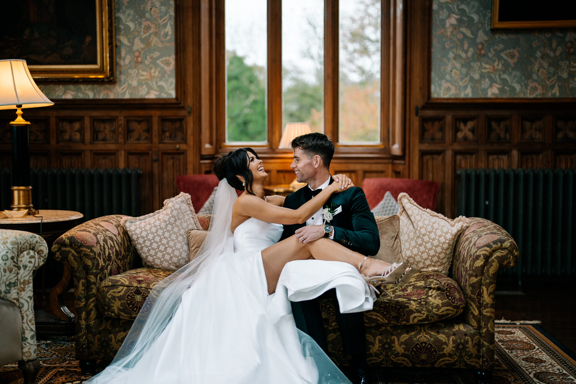 A man and woman sitting on a couch