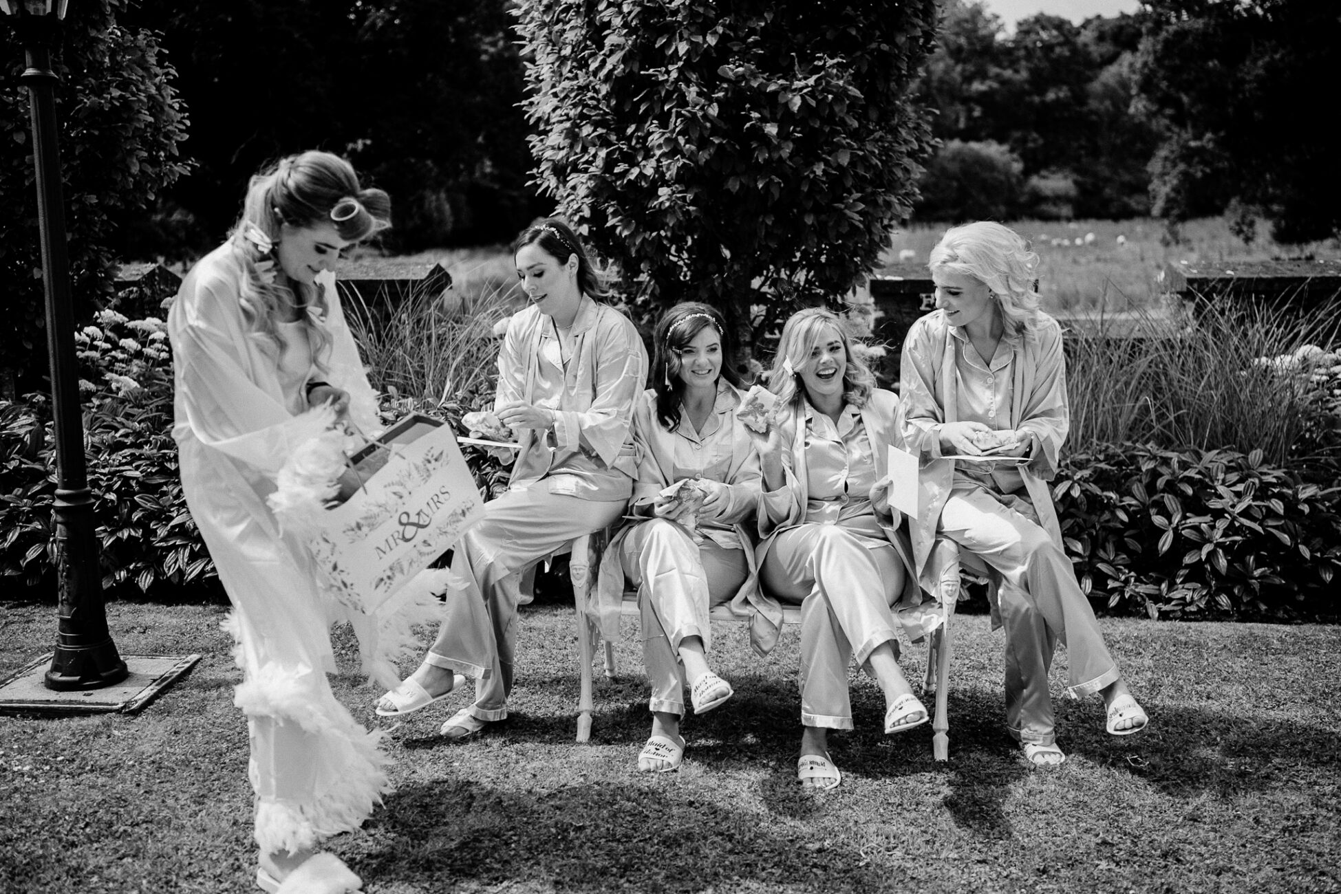 A group of women sitting on a bench