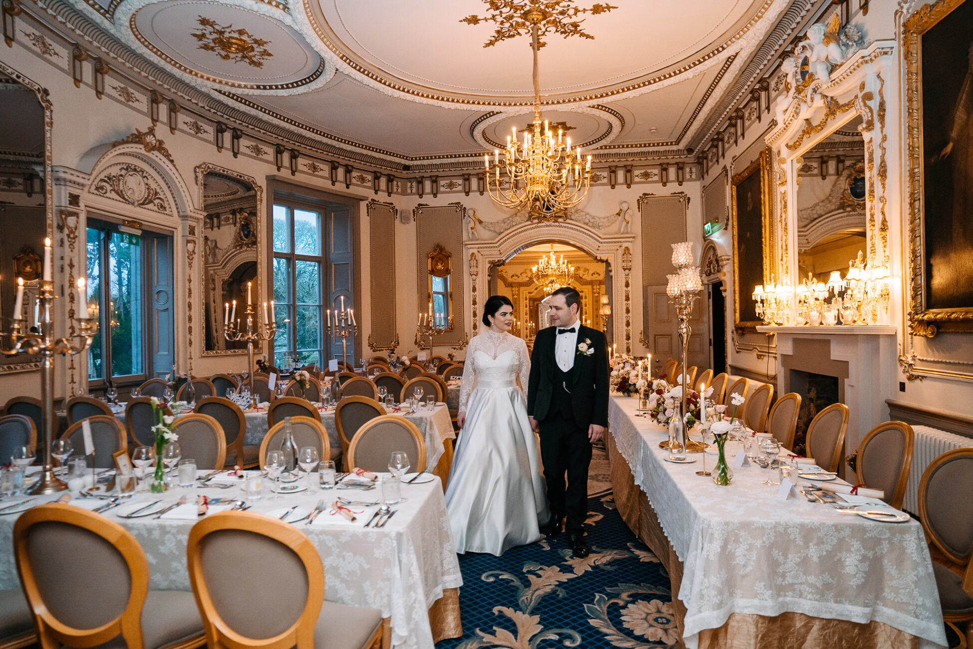 A bride and groom in a fancy dining room