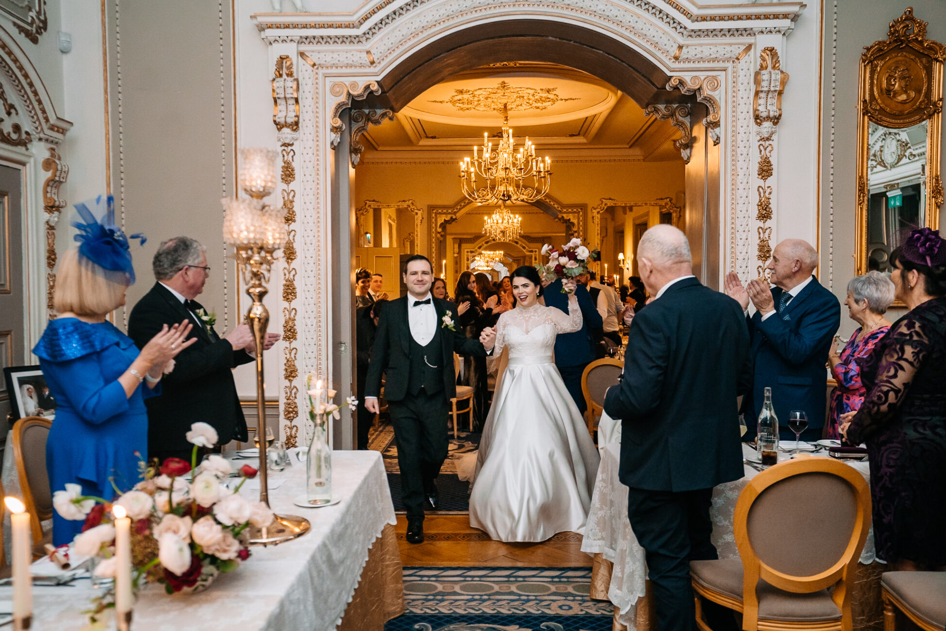 A bride and groom walking down the aisle