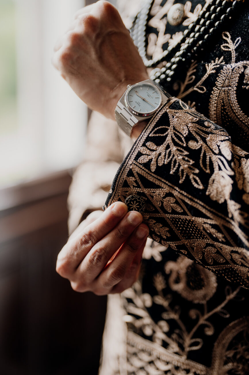 A person holding a watch