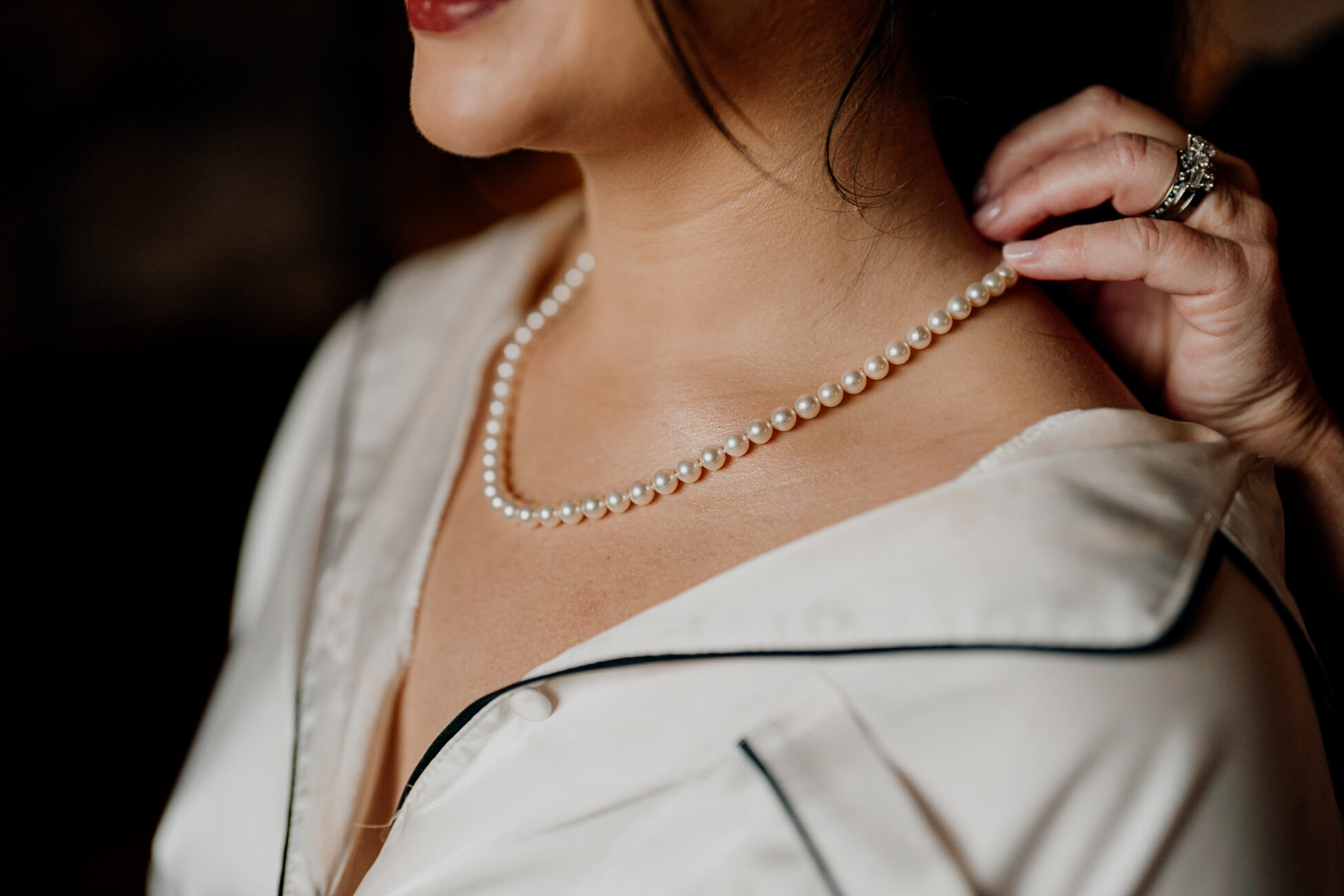 A woman wearing a white dress