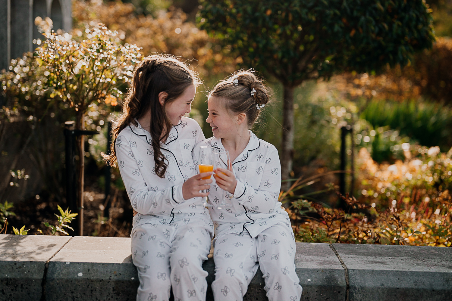 Two girls in white dresses