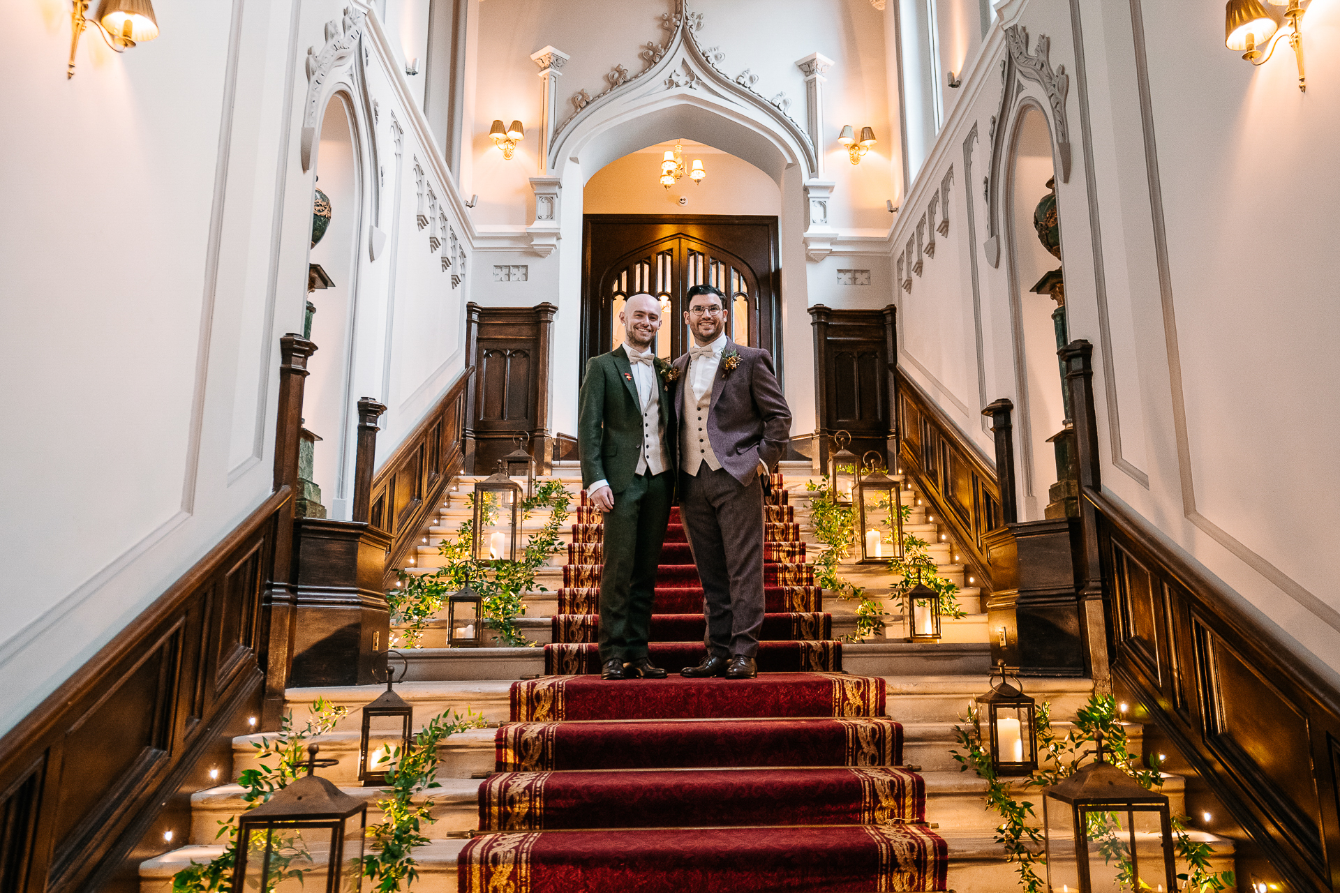 A man and woman standing on a staircase