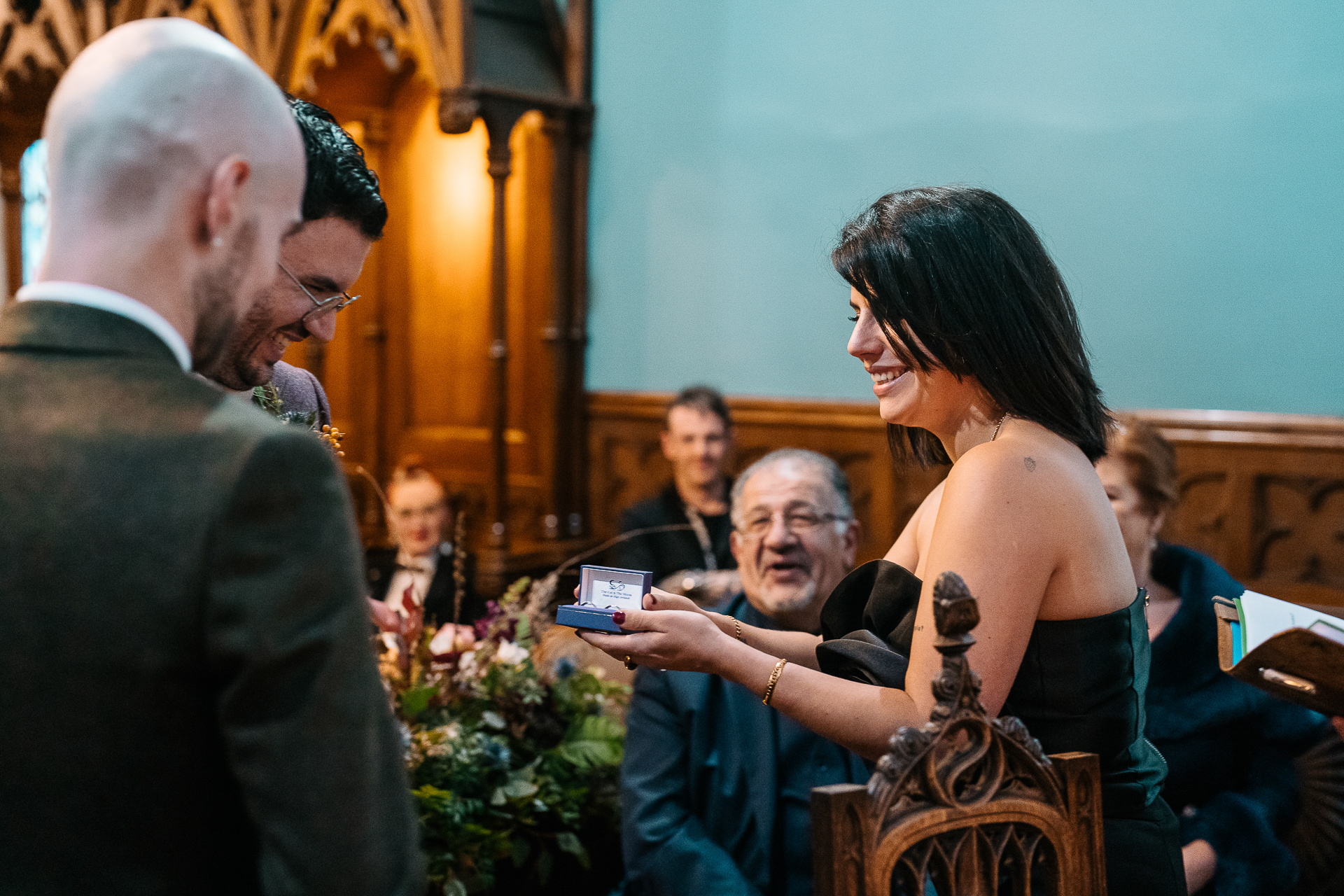 A man and woman looking at a cell phone