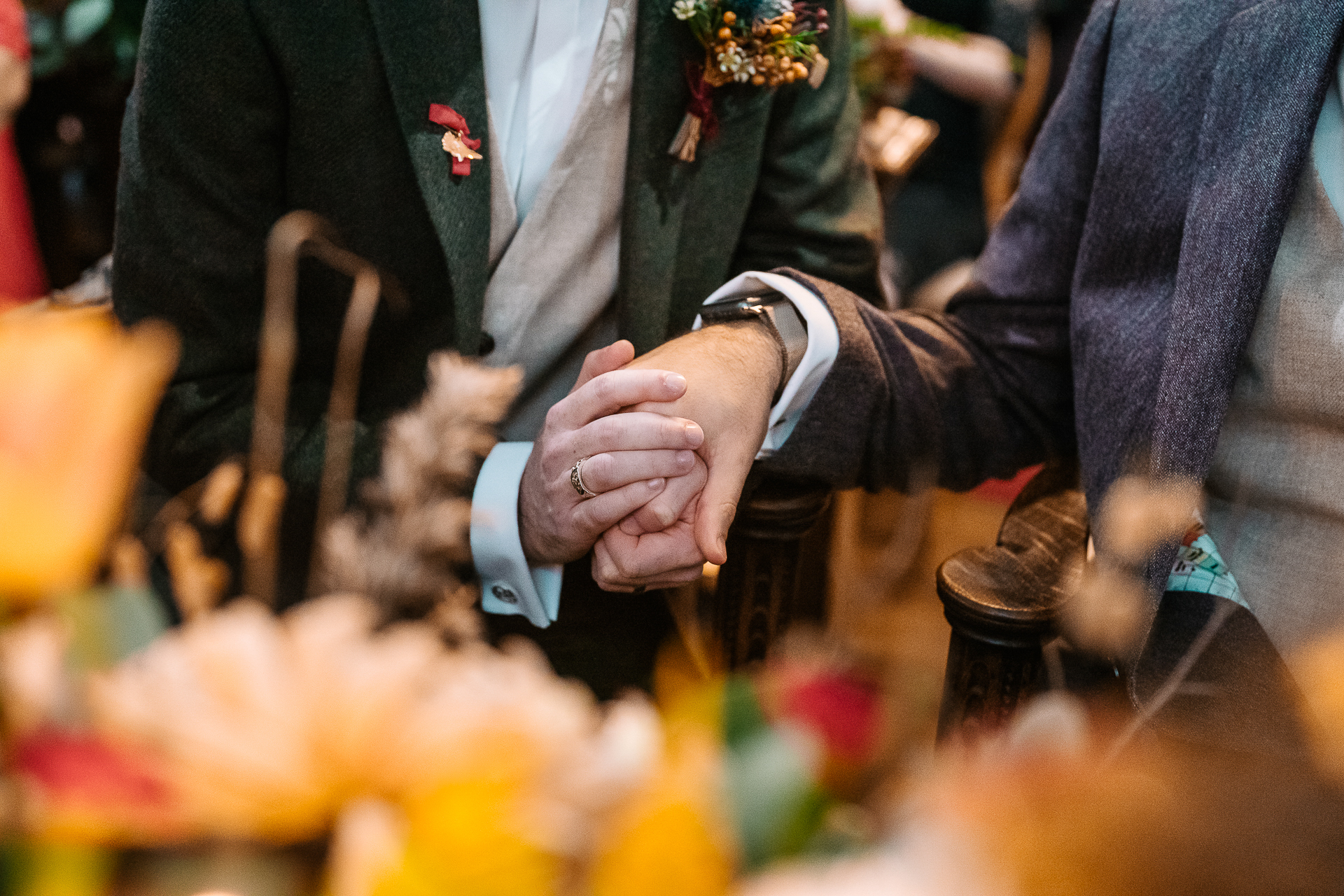 A man and woman holding hands