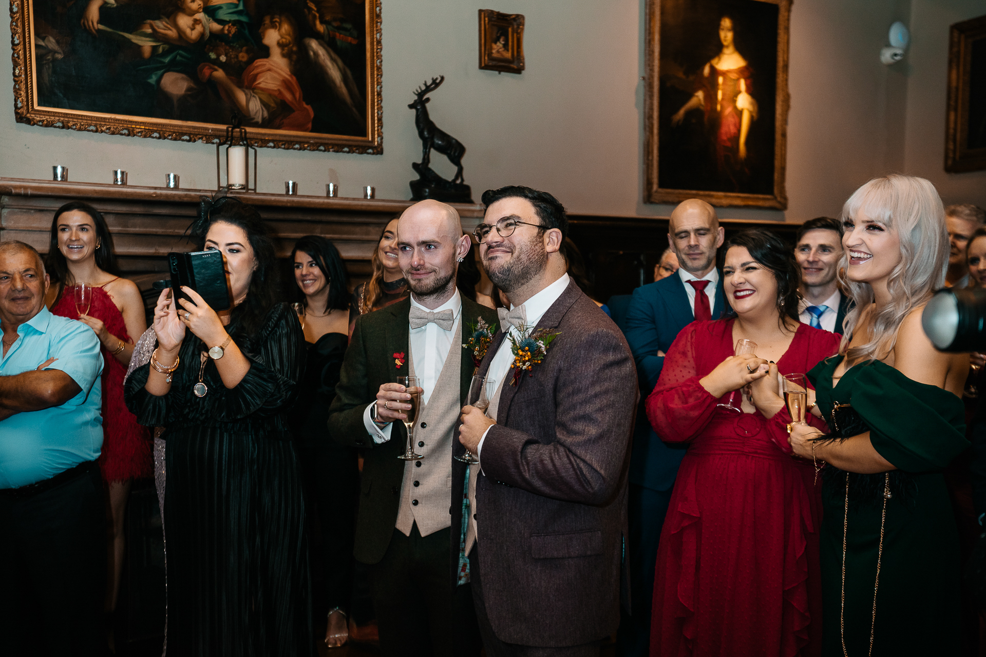 A group of people standing in a room