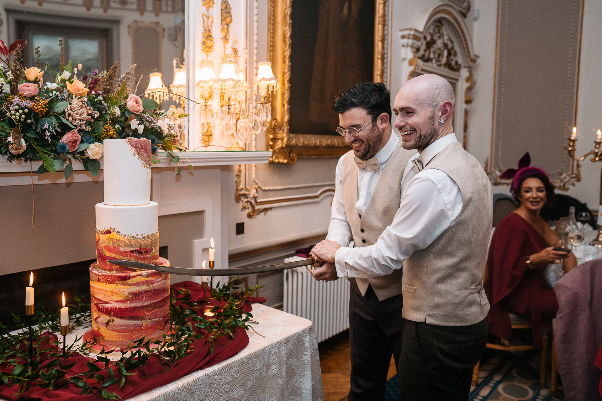 A man cutting a cake