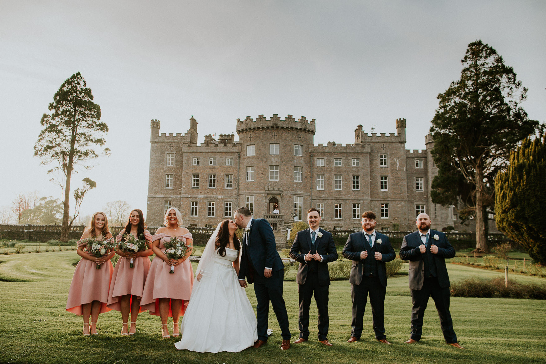 A group of people posing for a picture bridal party